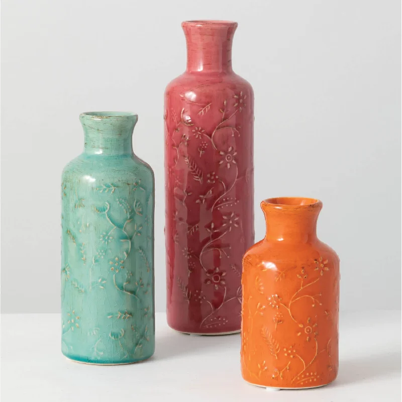 Vintage floral glass vase for retro charm-Floral Relief Bottle Set Of 3