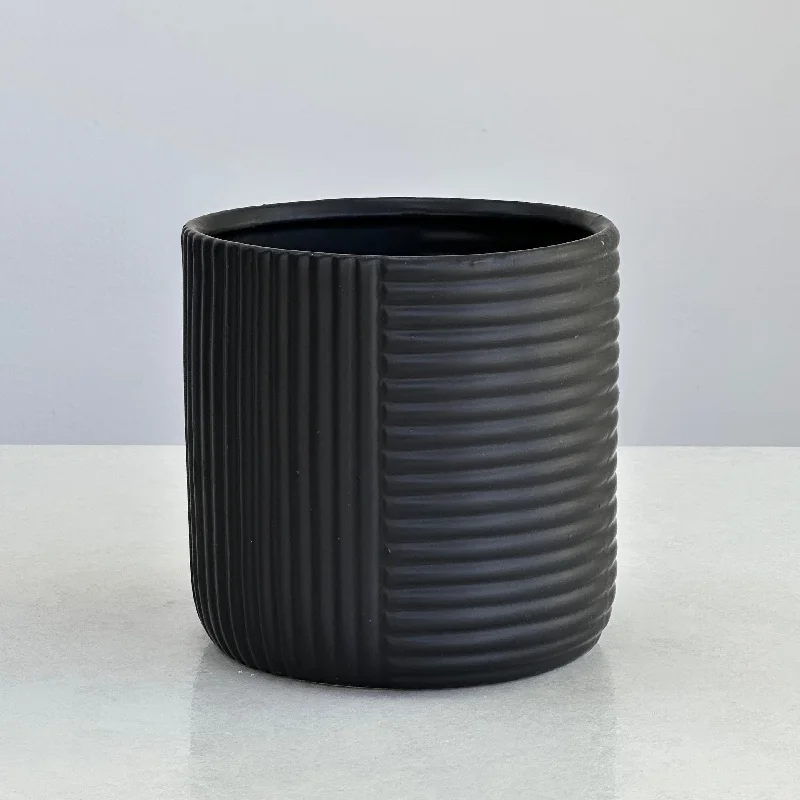 Contemporary blue vase for cool tones-Ceramic Black Round Pot With Abstract Lines