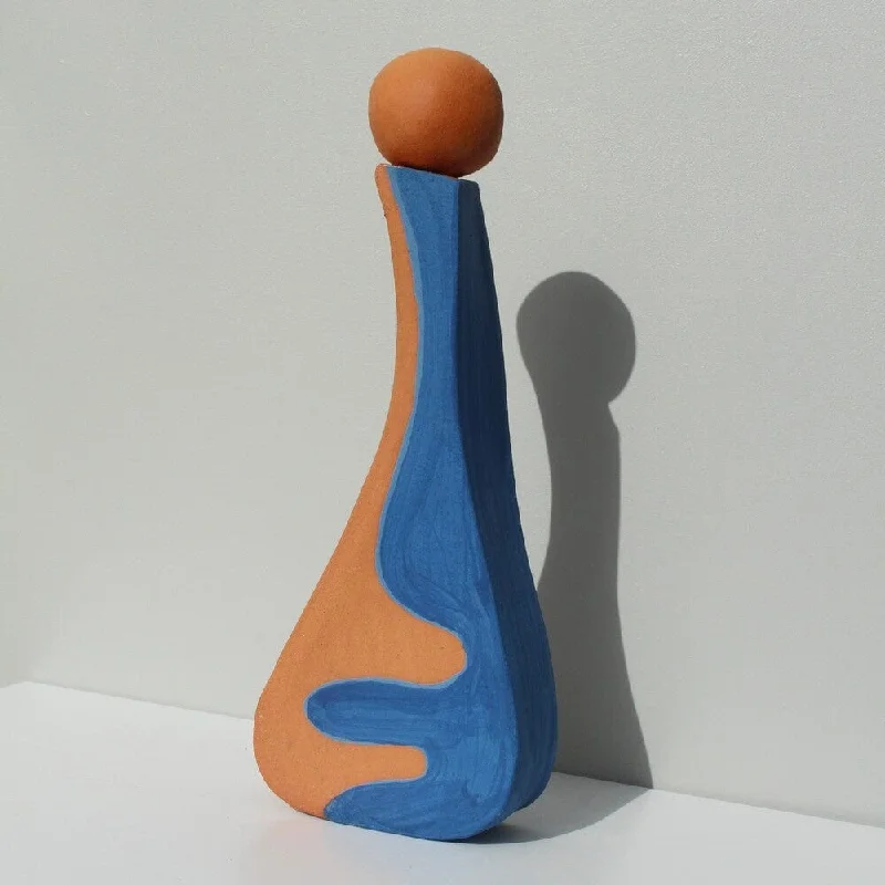 Tall minimalist ceramic vase for sleek-Leaning Terracotta Vessel In Blue